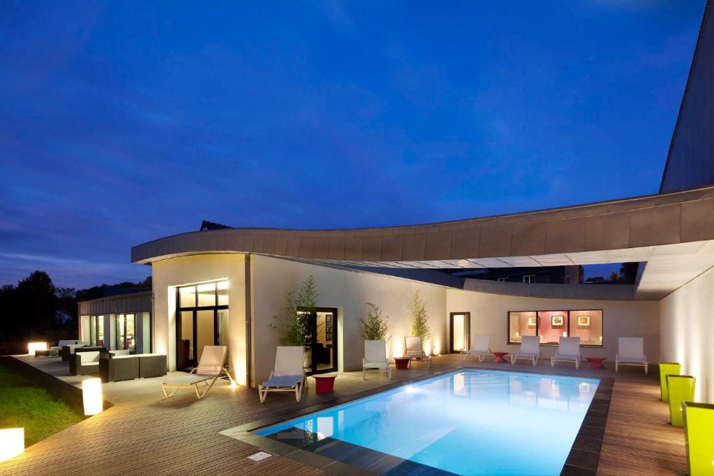 L'Aubiniere Hotel Restaurant & Spa Saint-Ouen-les-Vignes ภายนอก รูปภาพ
