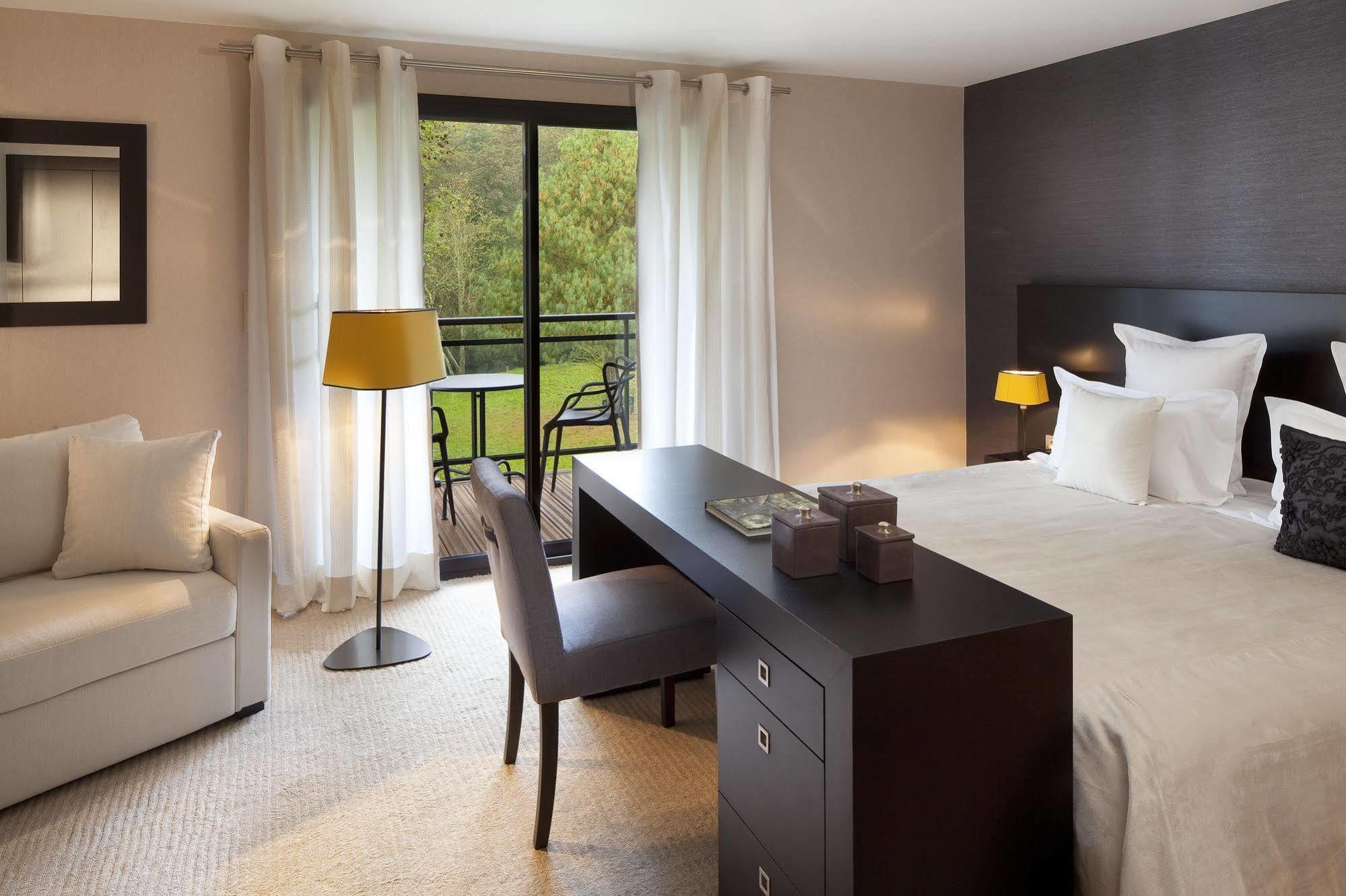L'Aubiniere Hotel Restaurant & Spa Saint-Ouen-les-Vignes ภายนอก รูปภาพ